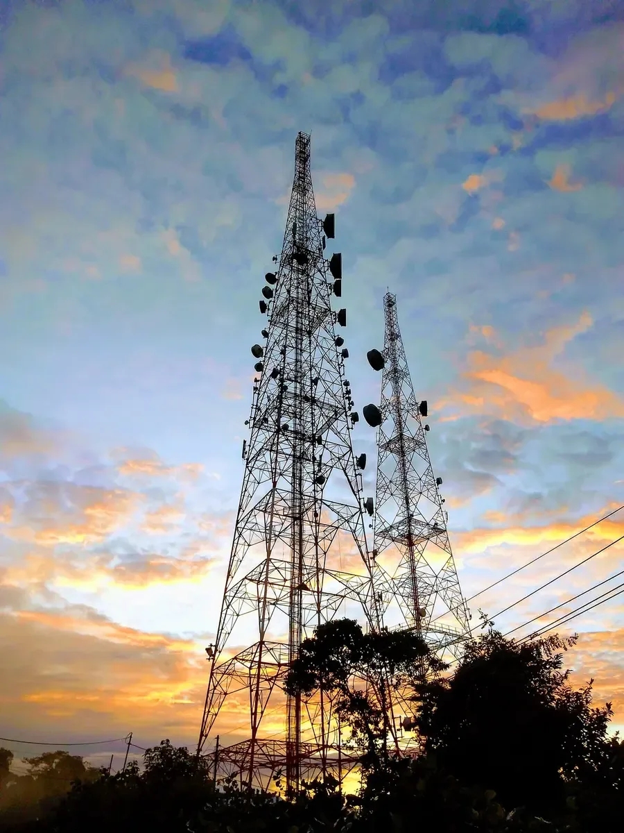 Telecommunications towers at sunset